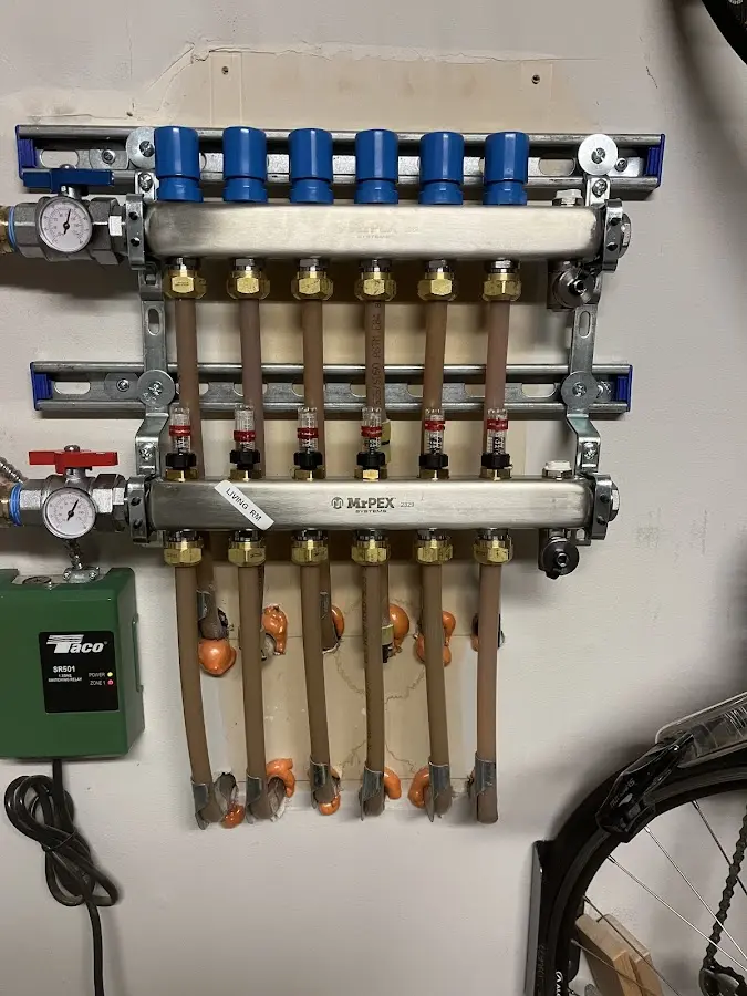 Plumber performing Water Heater Repair at a residential property in Pembroke